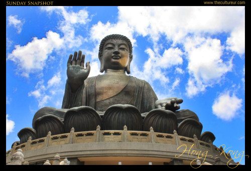 An upclose of Big Buddha statue (Tian Tan Buddha) after reaching to the top of the mountain of Po Lin Monastery at Ngong Ping Village in Hong Kong